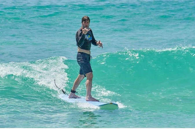 Learn to Surf in Paradise. - Timing, weather, and the cancellation rule