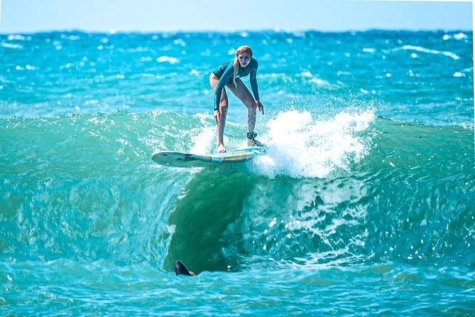 Learn to surf with a local big wave rider on the North Shore of Oahu - Entering the North Shore surf break