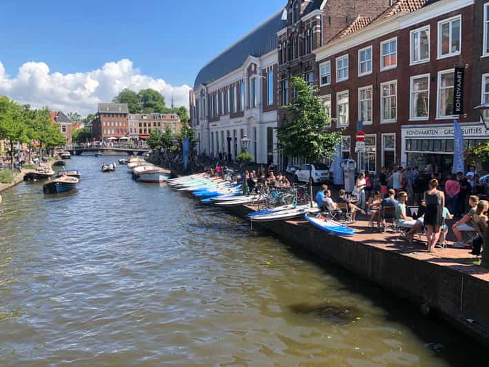 Leiden: Paddleboard Rental to Explore Leiden's Canals - Starting at Aalmarkt 4 beside Leiden’s boats