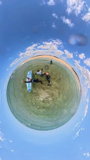 Lisbon: Surfing Lesson on Costa de Caparica Beach - In the water, expect coaching rather than a race
