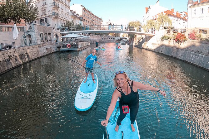 Ljubljana Stand-Up Paddle Boarding Lesson and Tour - Dragon Bridge from the water