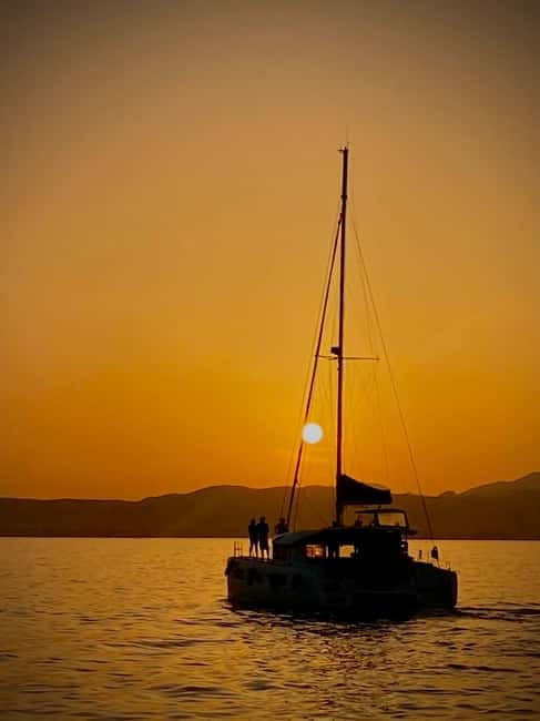 Majorca: Dinner aboard a private catamaran with snorkeling and paddle surfing - Leaving Palma from Avenida de Gabriel Roca 35