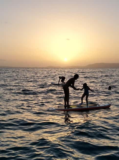 Majorca: Dinner aboard a private catamaran with snorkeling and paddle surfing - Swimming and snorkeling in a clear-water cove