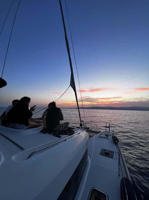 Majorca: Dinner aboard a private catamaran with snorkeling and paddle surfing - Practical packing advice for four hours aboard