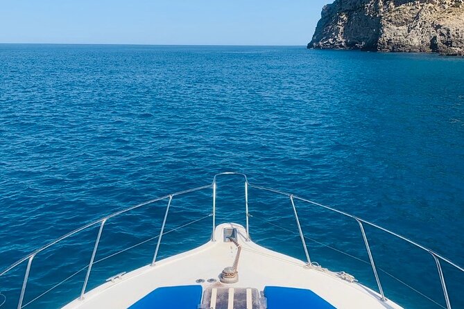 Mallorca Beach & Caves 4hr Boat Trip Drinks, Tapas, SUP & Snorkel - Cliff views and Mallorca’s coastal caves