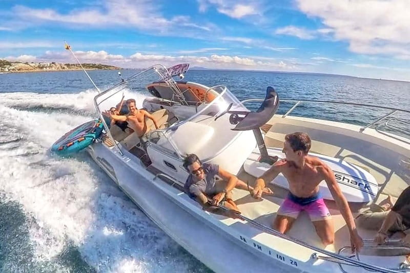 Mallorca: Private Watersports Boat. LUNCH Drinks SUP, Tubing - Cala Vinyes, Cap Falcó, and the coves in between