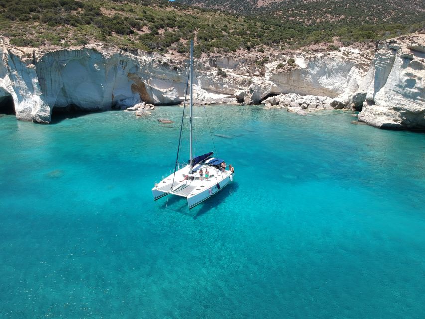 Milos: Full-Day Catamaran Cruise with Paddle Board - Wind, route changes, and what to pack