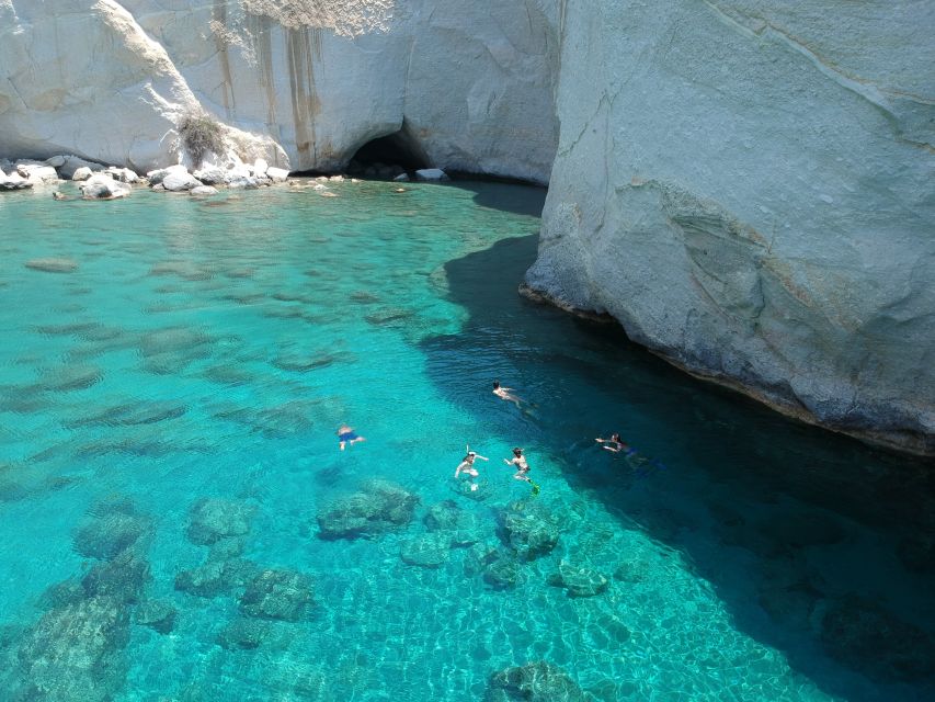 Milos: Full-Day Catamaran Cruise with Paddle Board - Leaving Adamas through Milos’ old port villages
