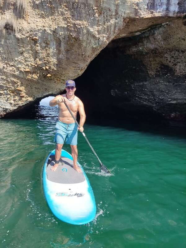 Mismaloya: Stand-Up Paddleboard & Snorkeling to Los Arcos - Passing through the stone arches