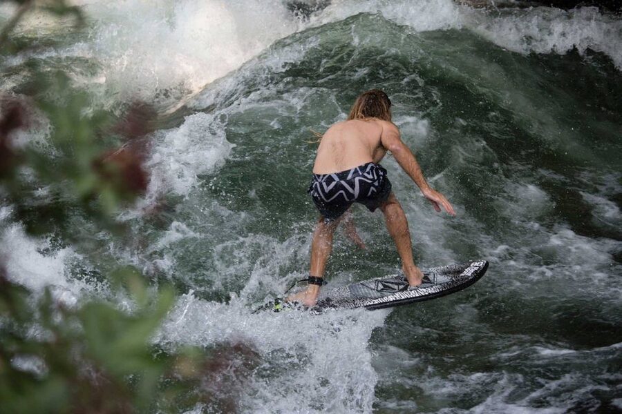 Munich Surf Experience Surfing In Munich Eisbach River Wave - Getting into the cold-water gear