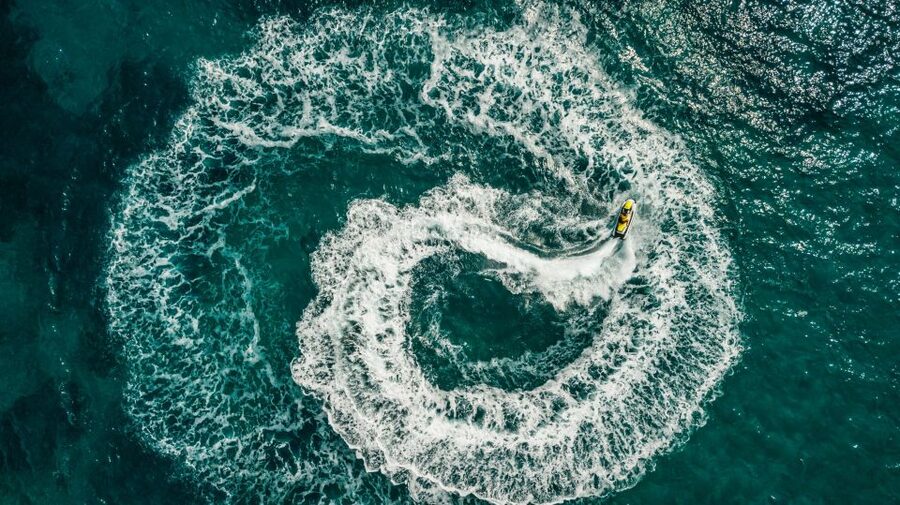 Mykonos: Super Paradise Beach Jet Ski, Canoe, & SUP Rental - Sea canoeing along the bay