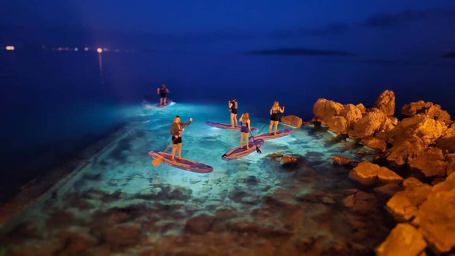 Opatija: Guided SUP Paddleboarding Adventure at Night - Learning the basics before you leave the beach