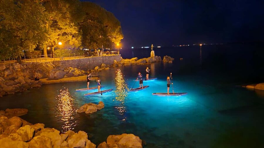 Opatija: Guided SUP Paddleboarding Adventure at Night - Paddling through the nearby bay