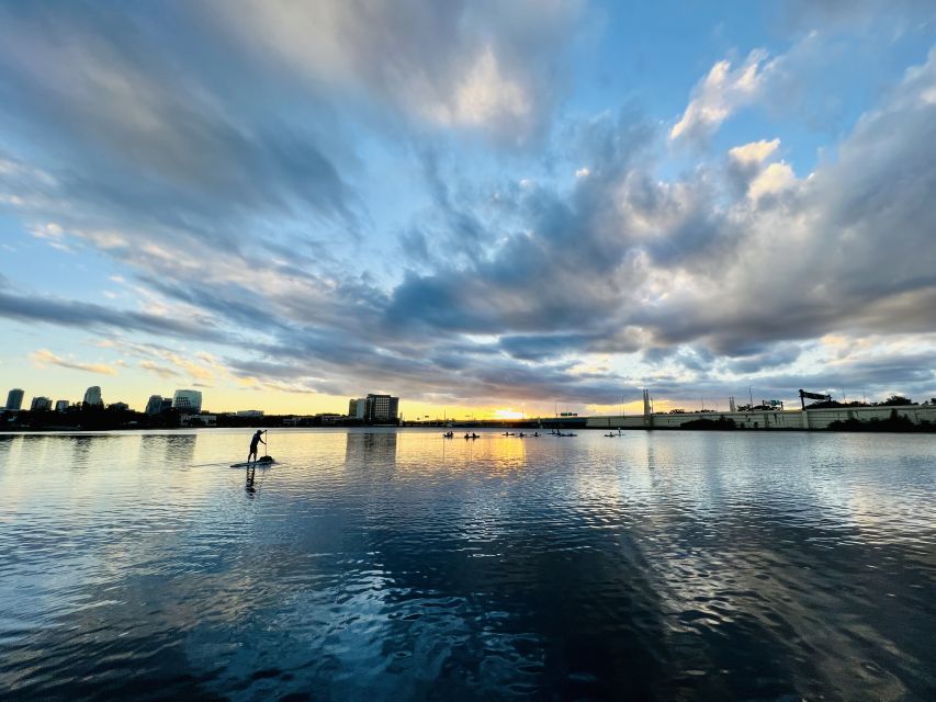 Orlando: Sunset Clear Kayak or Paddleboard in Paradise Tour - The skyline view gives the lake a local feel