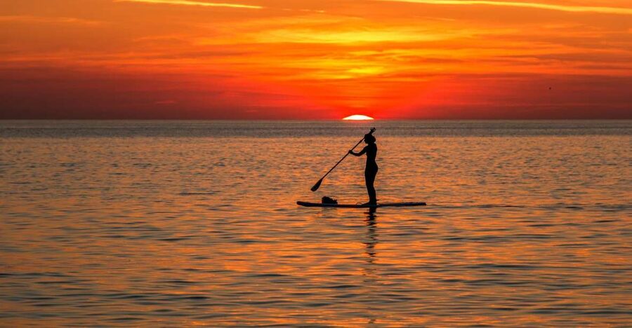 Paddle Board Rental: Glide on the Water with Ease - Santorini Seen From the Water