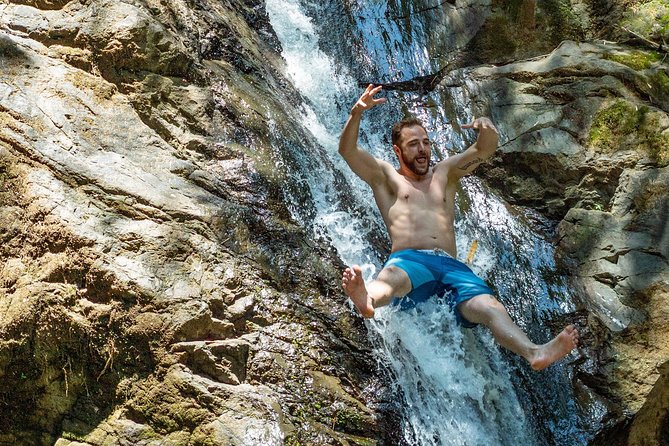Paddle Boarding & Waterfall Full Day Tour - A gentle paddle at Maracas Bay