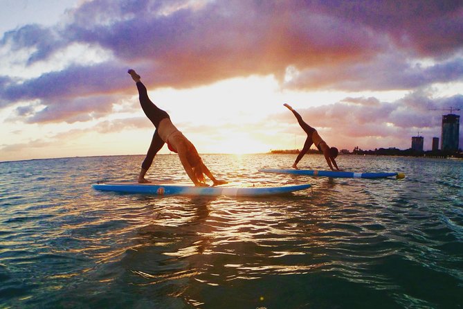 Paddleboard Yoga Class in Honolulu - The fun of falling, wobbling, and trying again