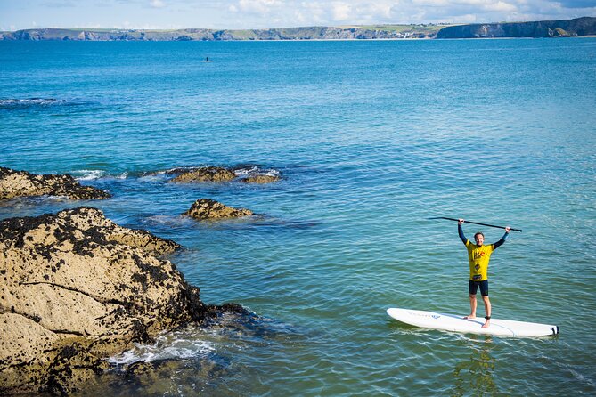 Paddleboarding Around Newquay's Coastline - Getting fitted for a board, paddle, and wetsuit