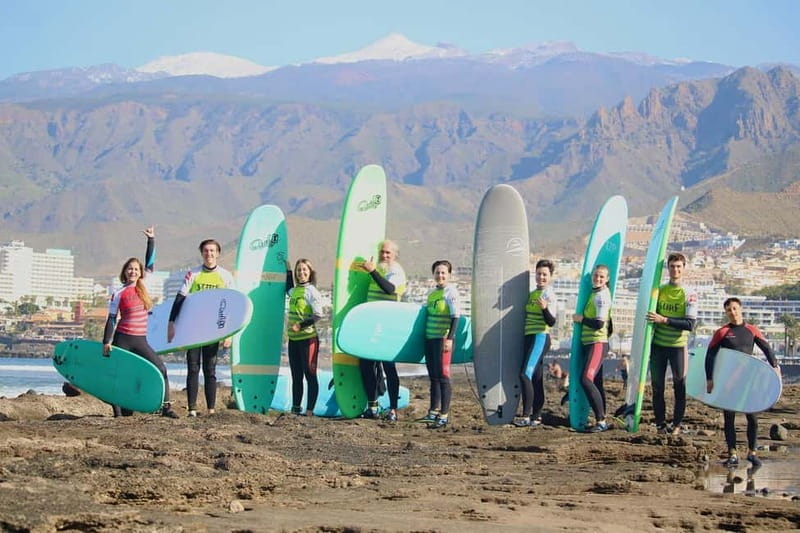 Playa de Las Americas: Surfing Lesson with Photo Analysis - Entering the water with an instructor beside you