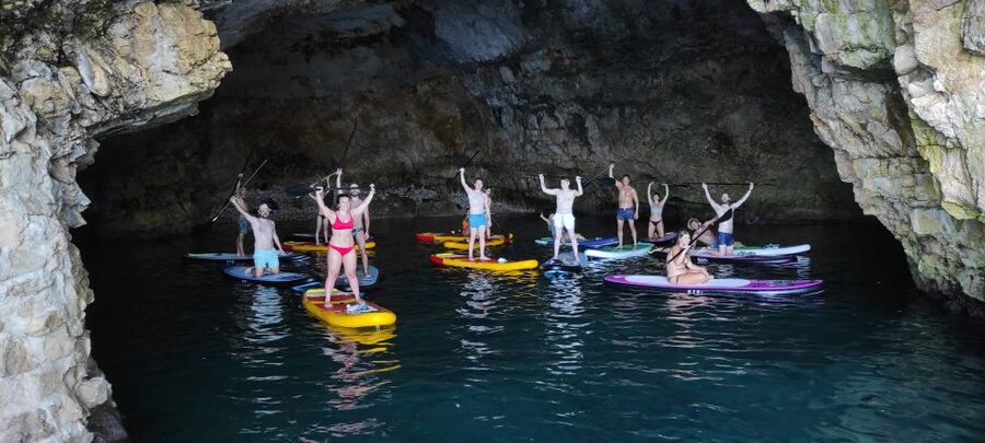 Polignano a Mare: Stand-Up Paddle Board Sea Cave Trip - Entering Grotta Palazzese and the coastal caves