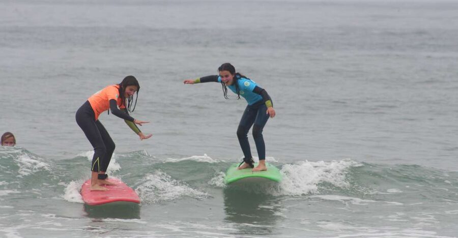 Porto: Small Group Surf Lesson with Transportation - Learning the basics on the sand