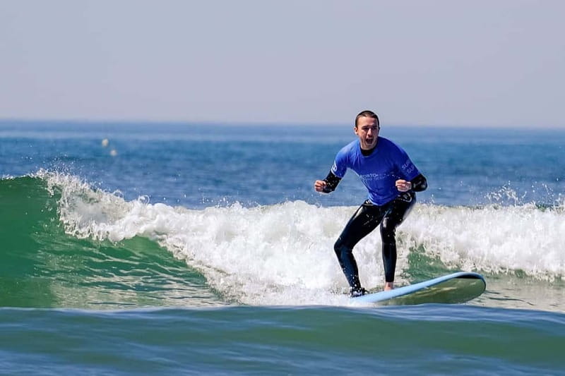 Porto: Surf Lessons with transfer at Porto Surf School - From Porto streets to the right beach