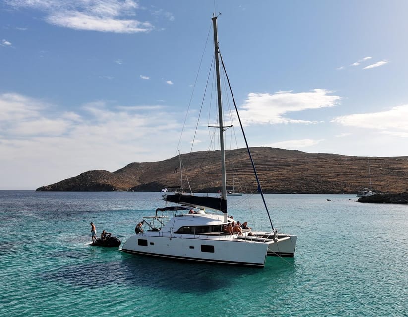 Private Catamaran Cruise Mykonos Delos with Meals & SUP - Rhenia is the reason to spend the afternoon at sea