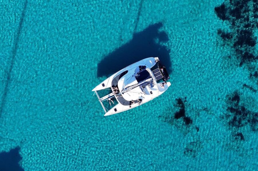 Private Catamaran Cruise Mykonos Delos with Meals & SUP - Passing Delos without turning the day into an archaeology tour