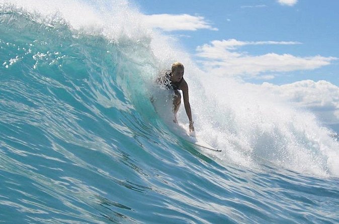 Private Guided Surf Boarding Lesson in Honolulu - Paddling, catching waves, and the first successful stand
