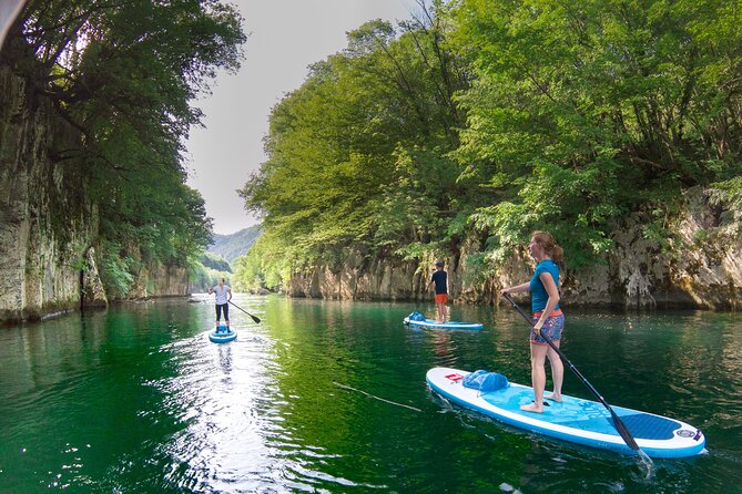 Private Half Day Stand-up Paddle Boarding on the Soča River - The beach break, fruit, and potato chips