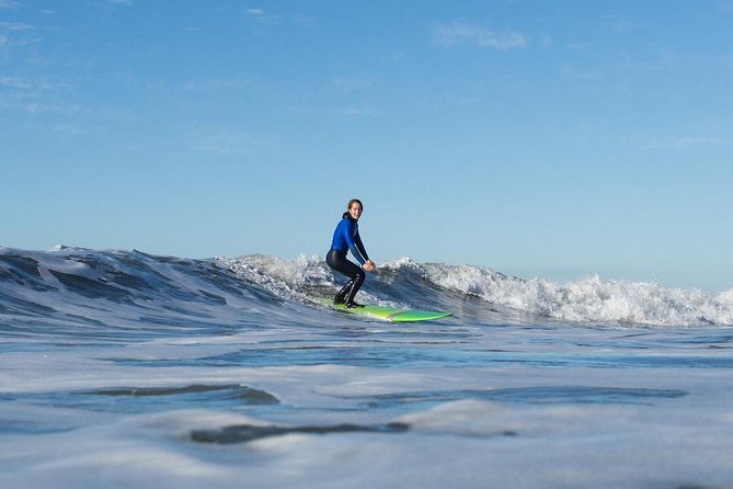 Private Surf Lesson with Instructor, Board, & Wetsuit - Catching your first waves with direct coaching