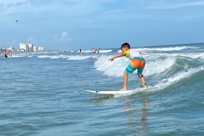 Private Surf Lessons in North Myrtle Beach - Moving into the water with a board provided