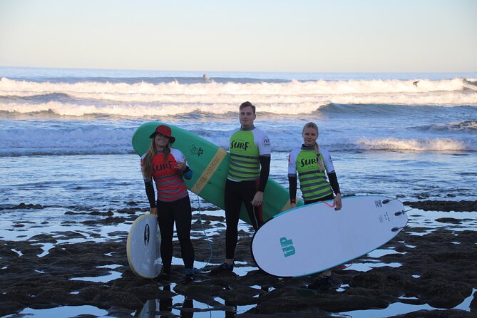 Private Surfing Lesson at Playa de las Américas - Boards, wetsuits, and reef booties included