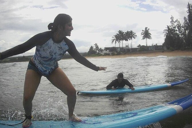 Private Surfing Lessons on the North Shore of Oahu - Moving from the beach into the water