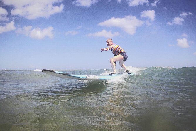 Private Surfing Lessons on the North Shore of Oahu - Catching your first wave at Puaʻena Point