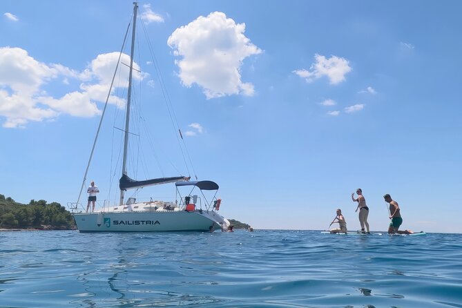 Pula Private Sailing Tour: 4-Hour Customizable Sail, Snorkel, SUP - Finding a quiet bay for swimming and snorkeling