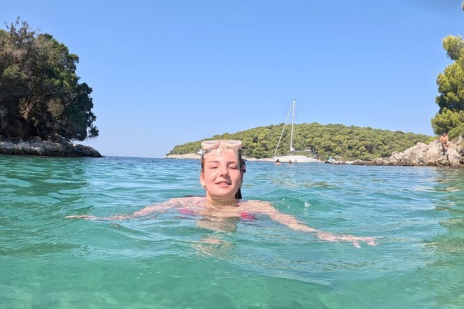 Pula Private Sailing Tour: 4-Hour Customizable Sail, Snorkel, SUP - Taking the SUP out from the boat