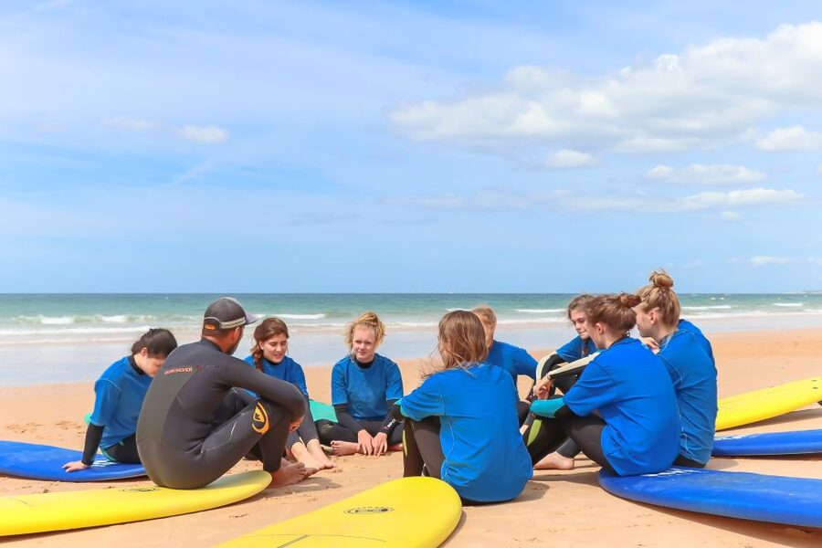 Quarteira: 2-Hour Surf Lesson at Falésia Beach - Working through the waves with an instructor