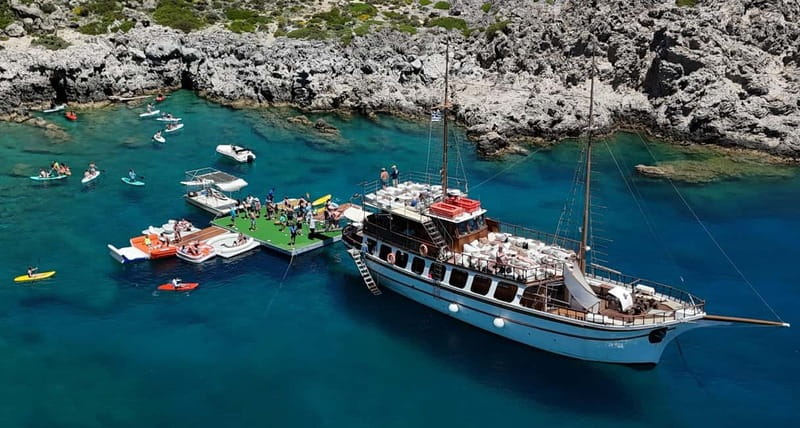 Rhodes: Gulet Trip with Food, Drinks, SUP, Kayak & Swimming - A wooden gulet with a simple, social rhythm