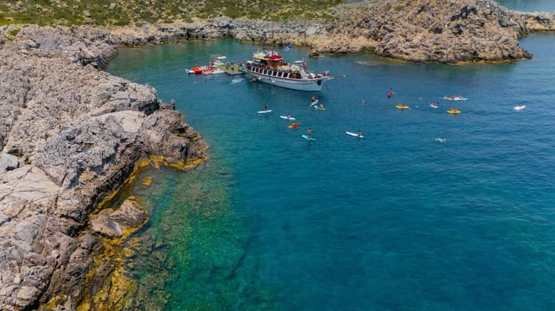 Rhodes: Gulet Trip with Food, Drinks, SUP, Kayak & Swimming - Greek lunch served aboard the boat