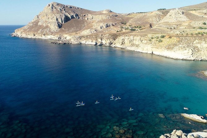Rhodes: Stand Up Paddle & Snorkel Adventure - Paddling beneath the cliff-lined coast
