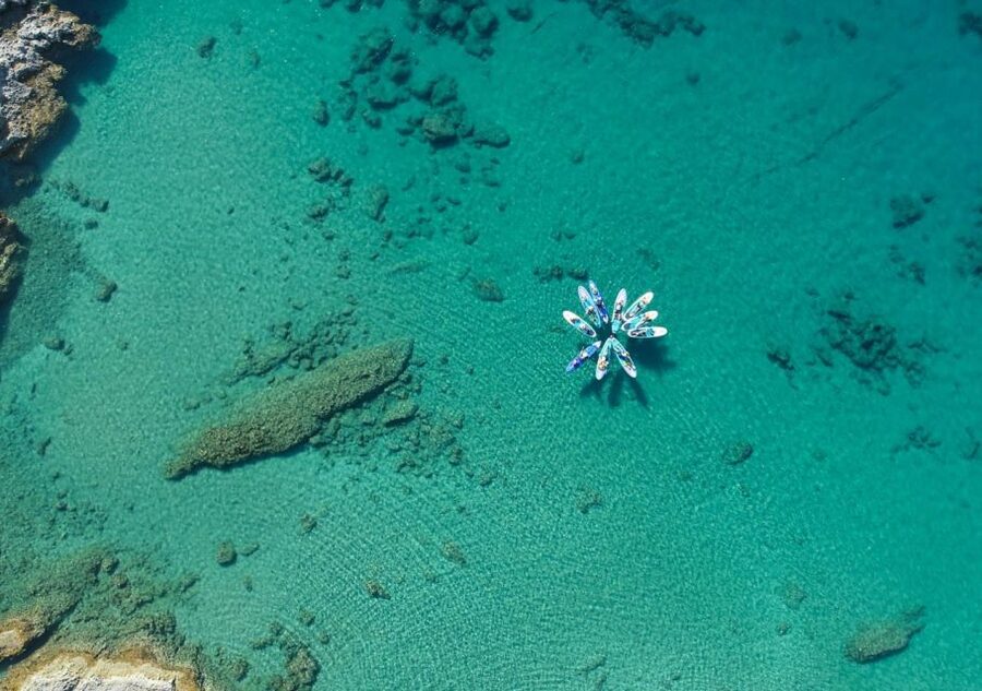Rhodes: Stand-Up Paddleboard and Snorkeling Tour - Paddling out from Stegna