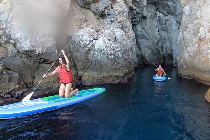 Santorini: Stand-Up Paddle and Snorkel Adventure - The small cove and cave possibility