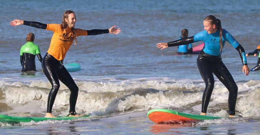 Scheveningen Full-day Surfing lessons with Lunch - Taking a board into the North Sea