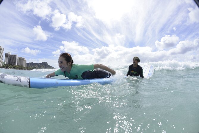 Semi-Private Surf Lesson for 2 or 3 people on Waikiki Beach - Paddling, catching waves, and learning the hard part