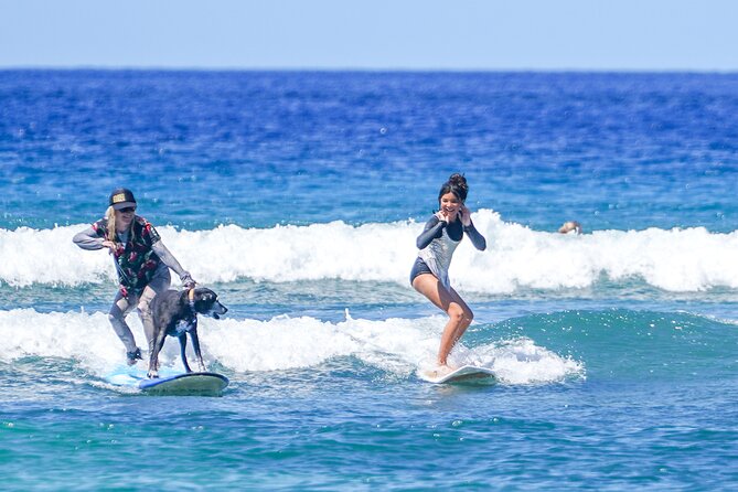 Semi Private Surf Lessons with Experienced Coaches - Boards, booties, and comfort details