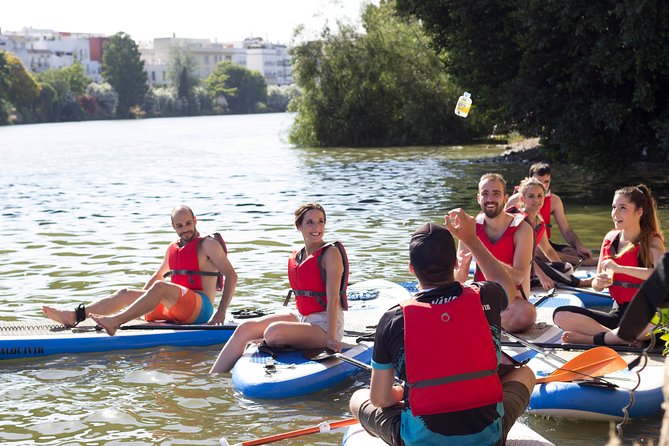 Seville Paddle Surf Sup in the Guadalquivir River - Triana, with a drink beside the river