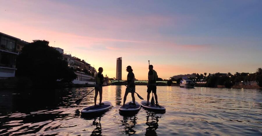 Seville: Sunset and Evening Paddle Boarding Tour - Triana Bridge and the first major views