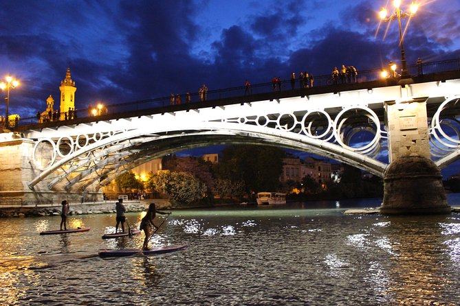 Seville: Sunset in Paddle Surf - Passing the Puente de San Telmo