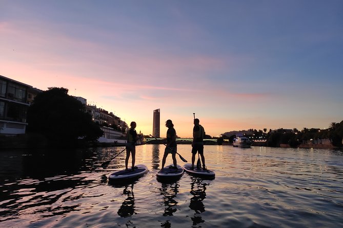 Seville: Sunset in Paddle Surf - The Torre del Oro from the river
